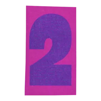 Number 2 sticker in cutout numbers.