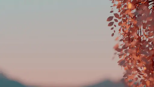 Leaves waving in breeze at sunset.