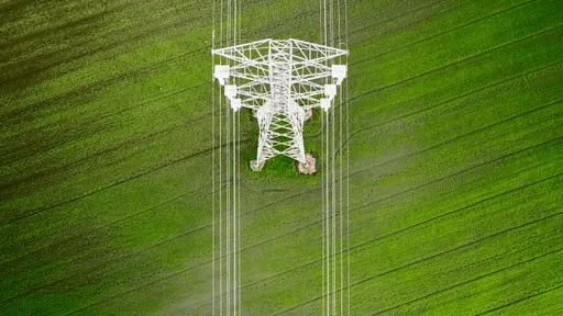 Transmission tower in field