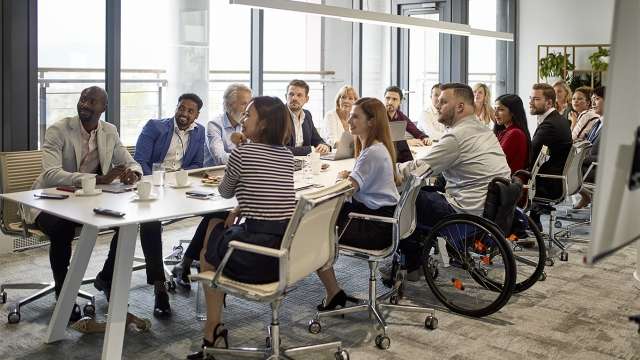 Coworkers meeting in a conference room