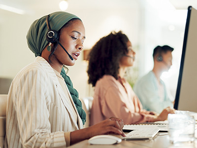 employees with headphones