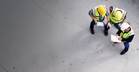 Construction workers conversing