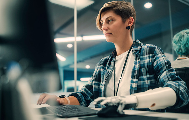 Female focus on work on her computer