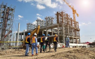 Construction workers at a building site.