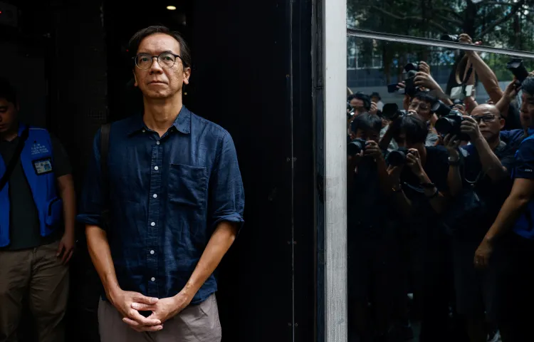 Chung Pui-kuen, former chief editor of Stand News, leaves the district court on bail after the verdict in a landmark sedition trial against two former editors of the now-defunct media outlet, in Hong Kong, China, on August 29.