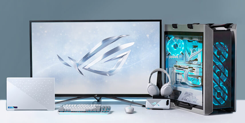 ROG gaming setup with peripherals, monitor, and gaming PC