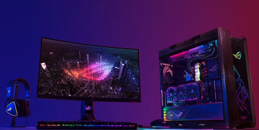 ROG gaming setup with peripherals, monitor, and gaming PC