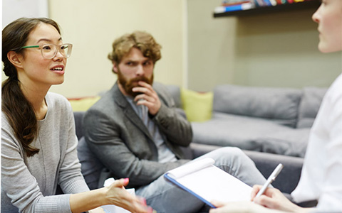 three people in a counseling session