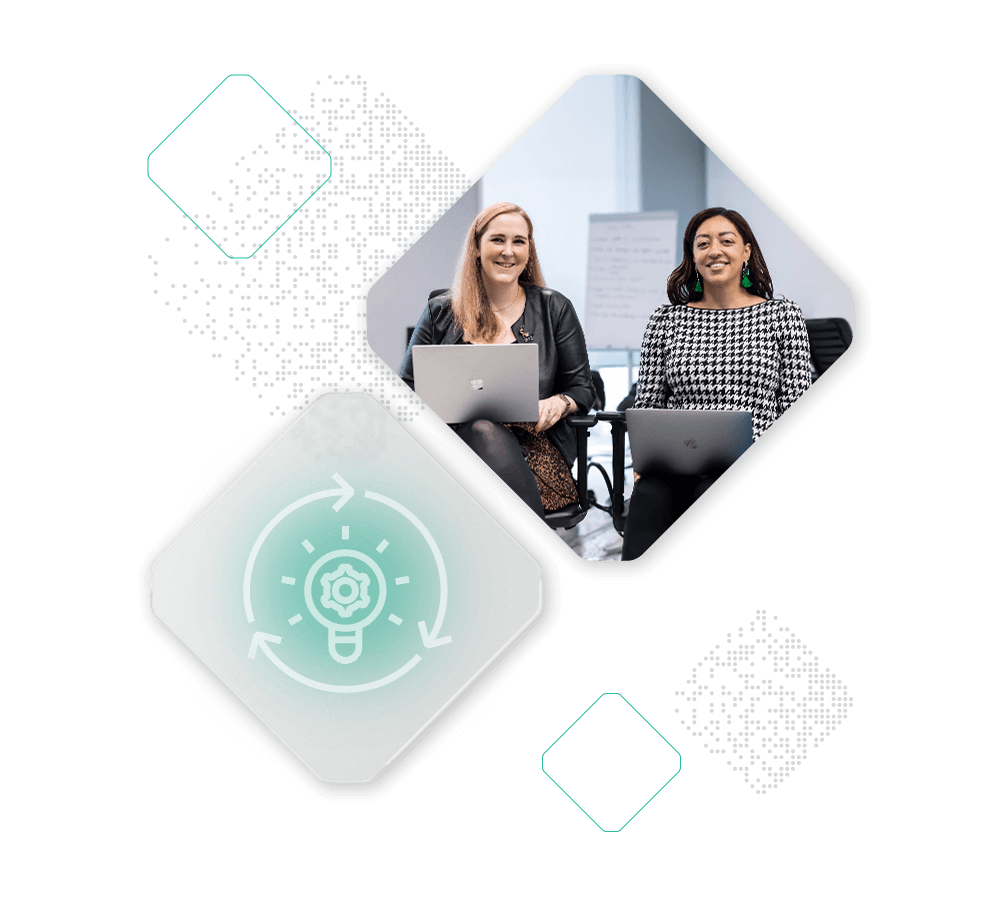 Two individuals seated and smiling while working on laptops, overlaid on a diamond shape. Another diamond shape with a gear and arrows icon is in the foreground, symbolizing workflow or process. Pixelated diamond designs are dispersed throughout the background.