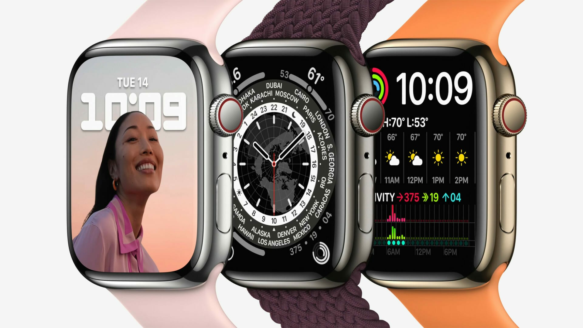 Three smartwatches displayed at Shoptalk Las Vegas feature unique screens: one shows a woman smiling, another displays a world clock, and the third highlights weather and health metrics. The stylish wristbands come in pink, brown, and orange.