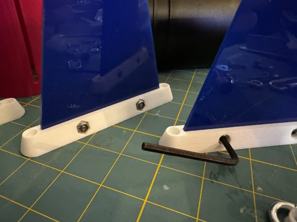 Detail of fins mounted in rails with allen wrench