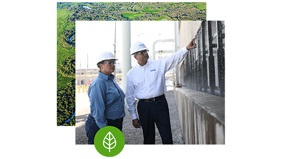 Protecting Earths Resources - two Ecolab employees looking at a plant