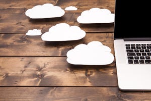 laptop close up with white clouds