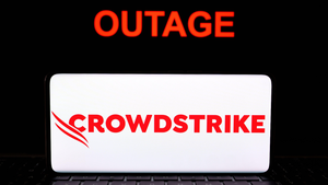 the word outage and crowdstrike logo on dark background