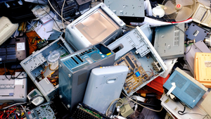 pile of discarded electronic devices