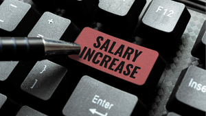 keyboard button that says salary increase