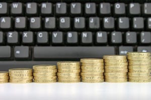 Coins in front of a keyboard