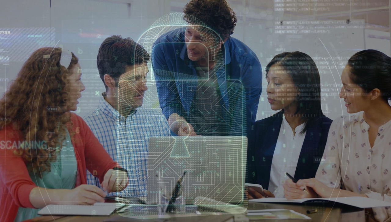 A group of five people talking in front of a laptop, beneath a digital overlay of a lock