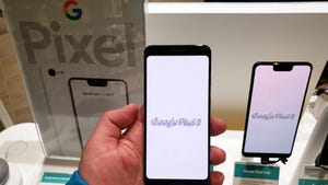 A hand holding a Google Pixel 3