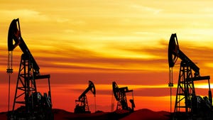 Oil pumps silhouette at colorful sunset