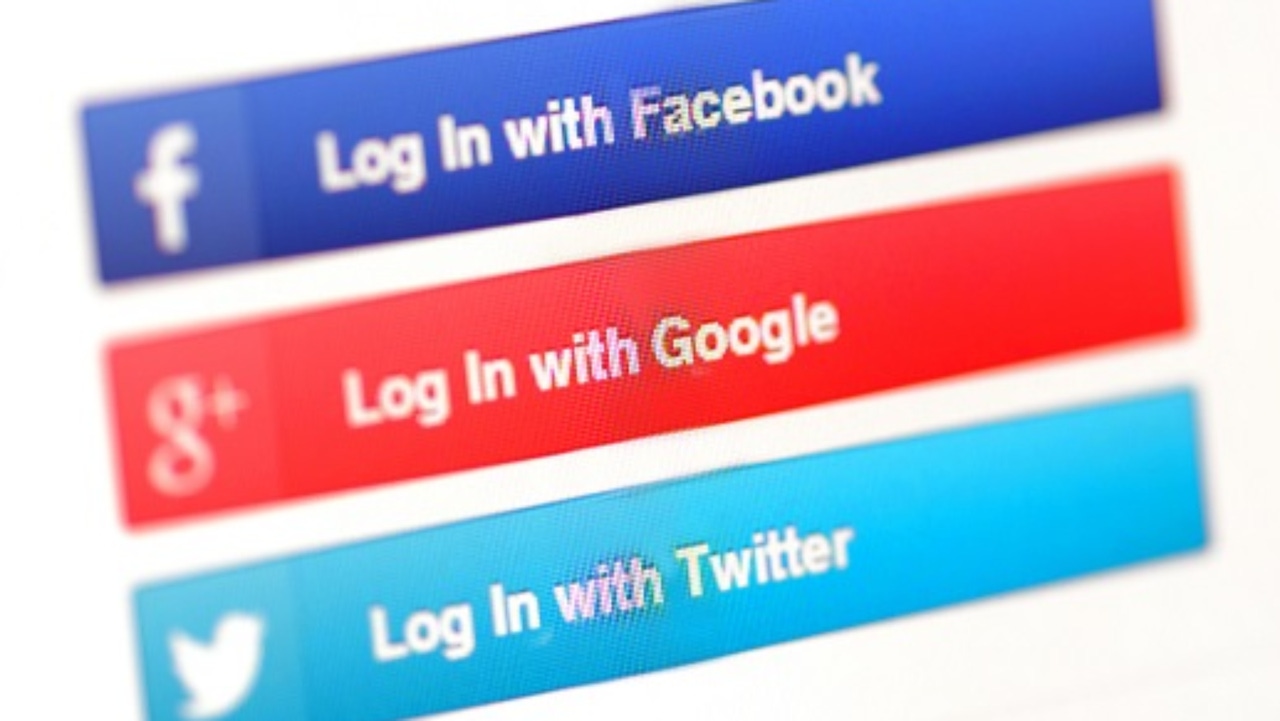 Three banners in dark blue, red and light blue that say Login with Facebook, Google, and Twitter, respectively