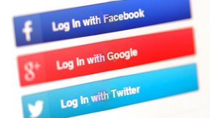 Three banners in dark blue, red and light blue that say Login with Facebook, Google, and Twitter, respectively