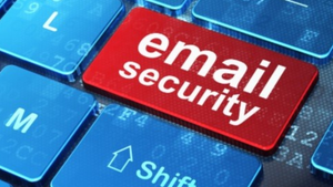 Red button on a computer keyboard that says "email security" in white