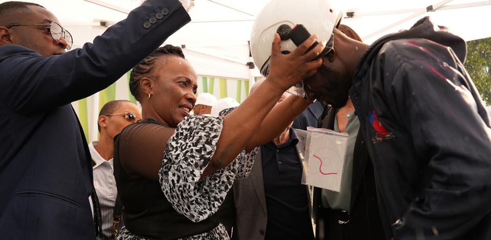 helmets handing out at the TotalEnergies Senderwood service station in Johannesburg - see description hereafter