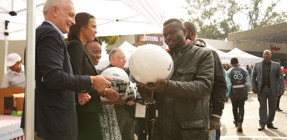 helmets handing out at the TotalEnergies Senderwood service station in Johannesburg - see description hereafter