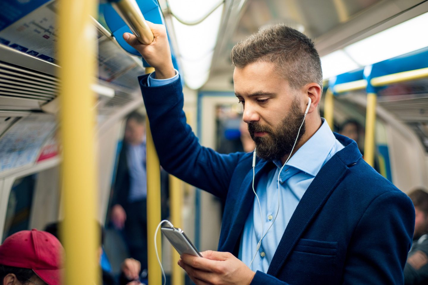 Serious businessman with headphones travelling to work. Standing inside underground wagon, holding handhandle. SSUCv3H4sIAAAAAAAEAH1RTU/EIBC9m/gfGs5thO23Rw/eTLwbD1MYd4ksbICuMZv+d6G0hoPxxnuPeTNv5nZ/VxRkAic5eSxuEQUslZqdt+Cl0YGm5cajkN5YCSqSkVtWhTgPfnboosVGcfB4DH8TudXvfd4SLnZhFUNFkMgrmotCUmaKm6eovKAmO7uU/1g8zU5qdO7hWWrQ/E+zrc2vX3q870nhiJp/r3mynBYVQsq5RSAtrcepG3nVHsRUNQOjFQxMVAdB8YNxLrAf1y7Jmnx+ebTnfFNXKdBkGGYhTba0q+GgYkGdTXKxkkt9zMqMP6HNDxAuaM4ZoY1fJydpHUSEC0XIakZpP/S06VpGm76jYd7lB6tHADQZAgAA