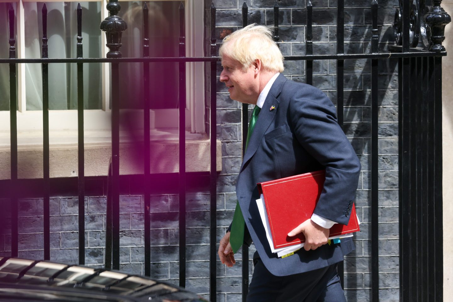 Boris Johnson, UK prime minister, departs 10 Downing Street to attend a weekly questions and answers session at Parliament in London, UK, on Wednesday, July 13, 2022. Rishi Sunak, whose resignation last week helped trigger Boris Johnsons downfall, heads a final list of eight candidates seeking to become the next Conservative Party leader and UK prime minister. Photographer: Hollie Adams/Bloomberg via Getty Images