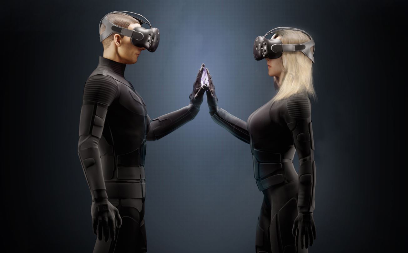 Two people wearing full haptic body suits and headsets, touching hands.