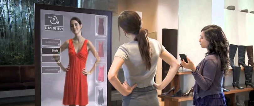 A person trying clothes through an Augmented Reality application.