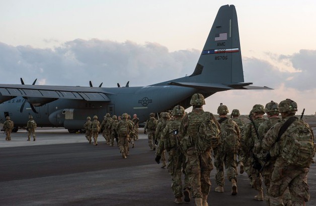 Soldiers entering a plane