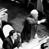 Nikita Khrushchev, Chairman of the Council of Ministers of the USSR, is seen rising to his feet during the address of UK Prime Minister Harold Macmillan during the UN General Assembly's general debate in 1960. (file)