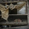 A young child sleeps in a shelter at the Kyein Ni Pyin camp in Rakhine province, Myanmar. Over 700,000 members of the Rohingya community have been forced from their homes as a result of widespread and systematic violence.