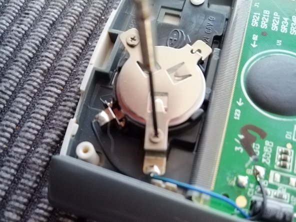 TI-30-XB Battery Replacement, Eject the battery: step 2, image 1 of 3