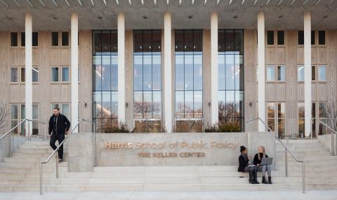 Students sitting on the Keller Center's front steps