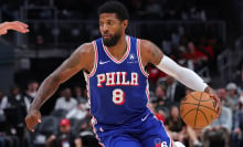 Paul George of the Philadelphia 76ers drives