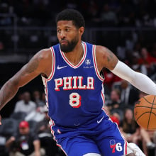 Paul George of the Philadelphia 76ers drives