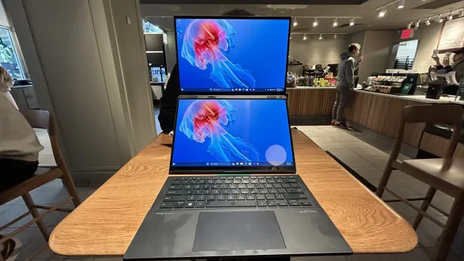 Asus Zenbook Duo on a table at a coffee shop