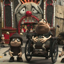 In the stop-animation film "Memoir of a Snail," three characters stand in Luna Park, Melbourne.