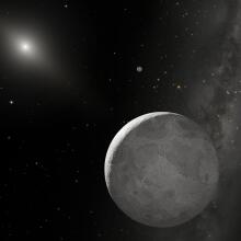 Two Kuiper Belt objects in the distant solar system (illustration)