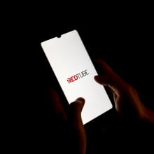 Redtube logo displayed on a smartphone screen