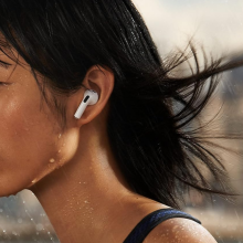 A person working out with a pair of Apple AirPods