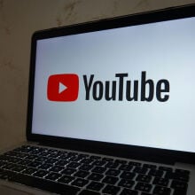 YouTube logo on laptop screen