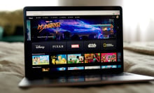 The Disney+ website shown on a laptop.