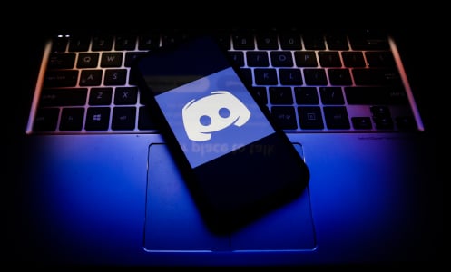 Discord logo displayed on a phone screen