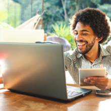 Young man using laptop in the living room