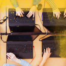 hands working on keyboards